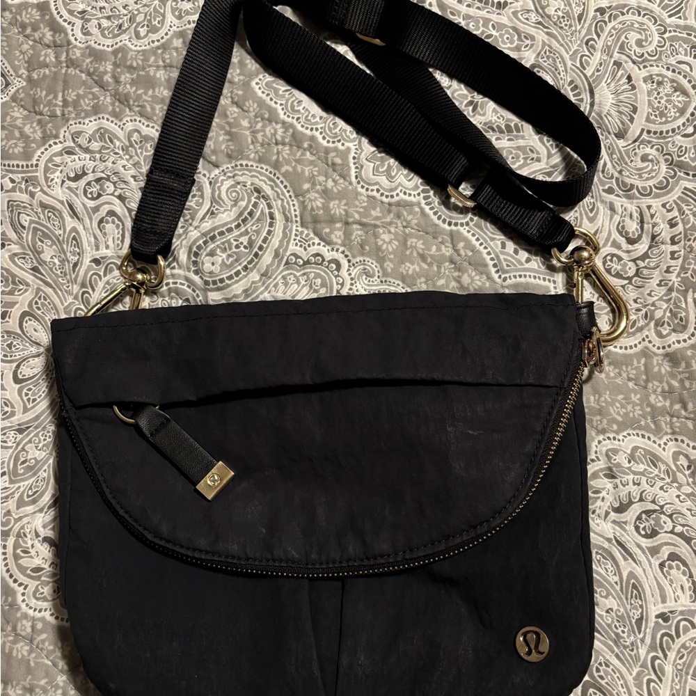 lululemon athletica black Crossbody Bag well loved. Read description.